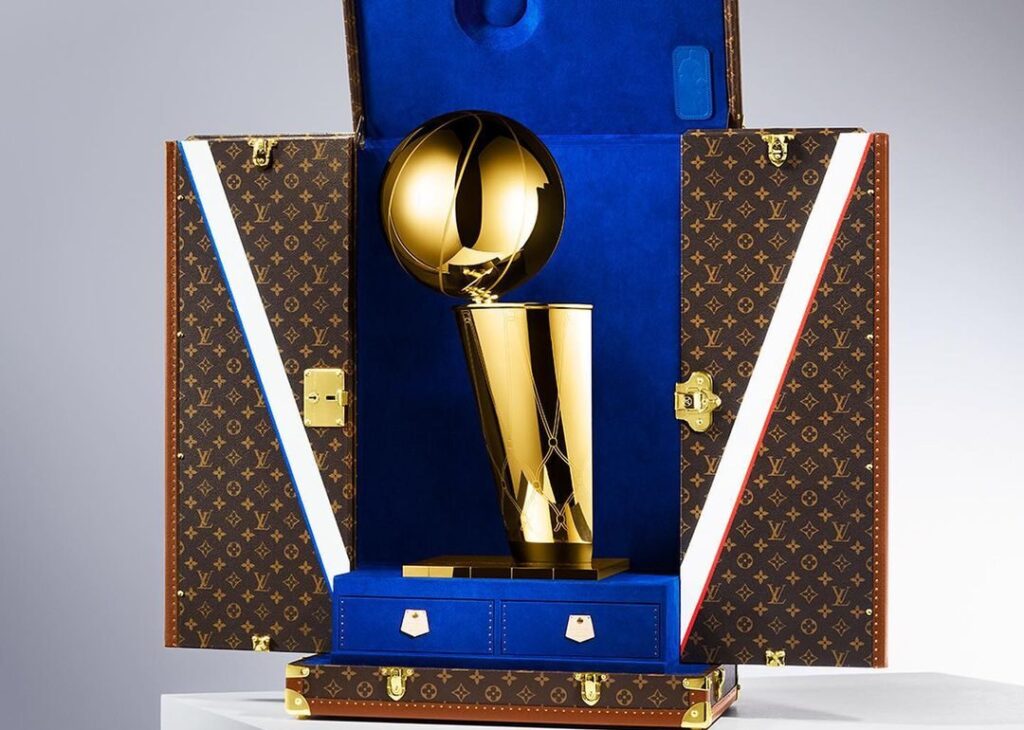 THE RUGBY WORLD CUP TROPHY PRESENTED IN A CUSTOM MADE LOUIS VUITTON CASE